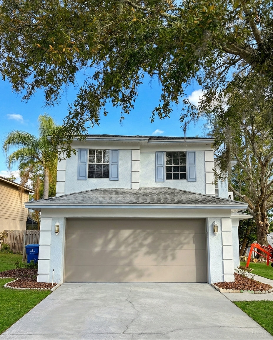 Modern Flush Panel - Hurricane Rated in Almond installed on a home (double-car)