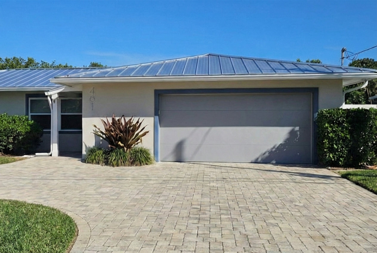 Modern Flush Panel - Hurricane Rated in Gray installed on a home (double-car)