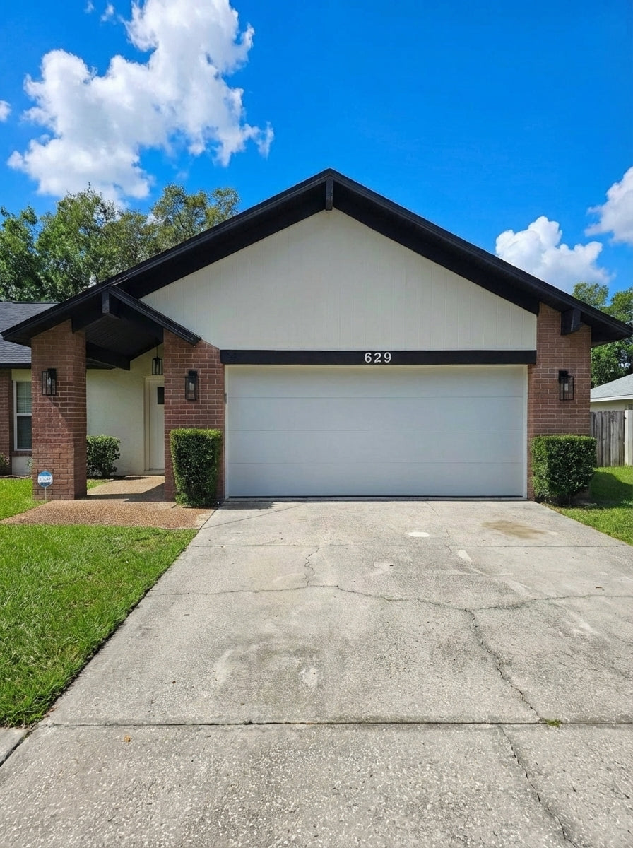 Modern Flush Panel - Hurricane Rated in White installed on a home (double-car)