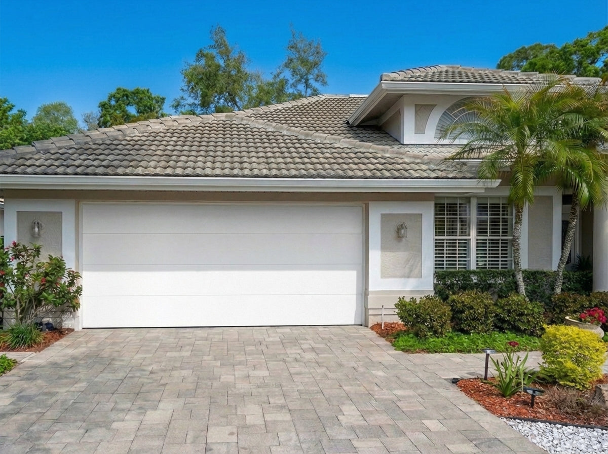 Modern Flush Panel - Hurricane Rated in White installed on a home (double-car)