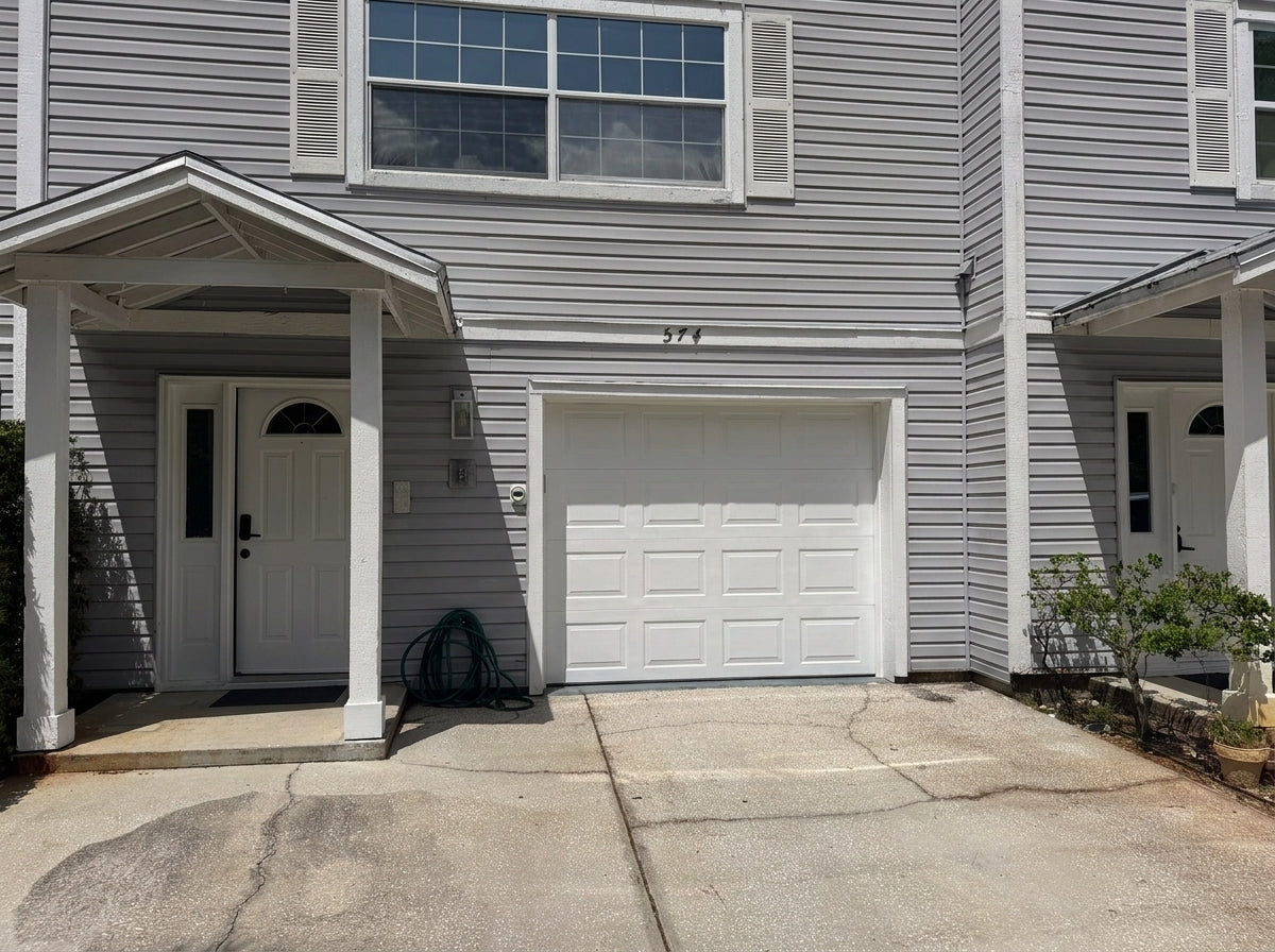 Classic Short Raised Panel - Hurricane Rated in White installed on a home (single-car)